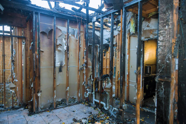 Professional Fire Damage Restoration technician working in Bay City, MI